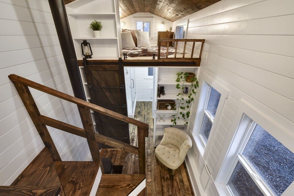 Rustic Loft - A Luxury 273 Square Feet Tiny House on Wheels 14 Rustic themed tiny house on wheels