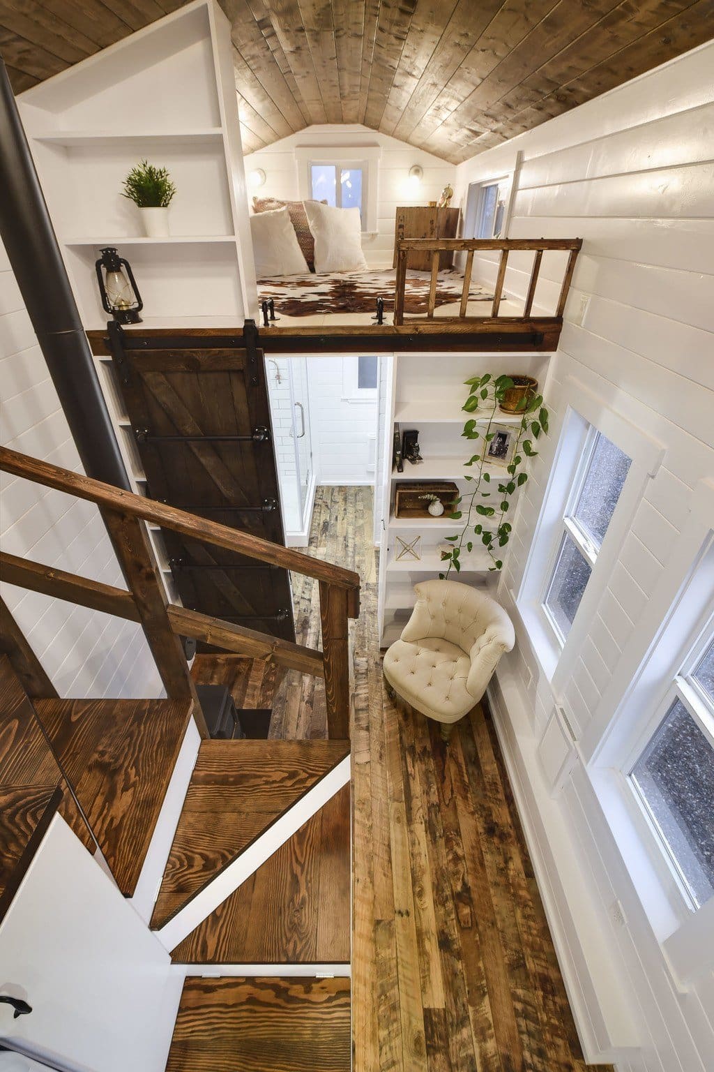 Rustic Loft - A Luxury 273 Square Feet Tiny House on Wheels 4 Rustic themed tiny house on wheels