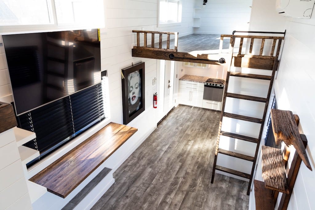 This 385-Square-Foot Modern Tiny House on Wheels Includes a Loft! 1 This modern tiny house on wheels has a modern interior fit for modern families