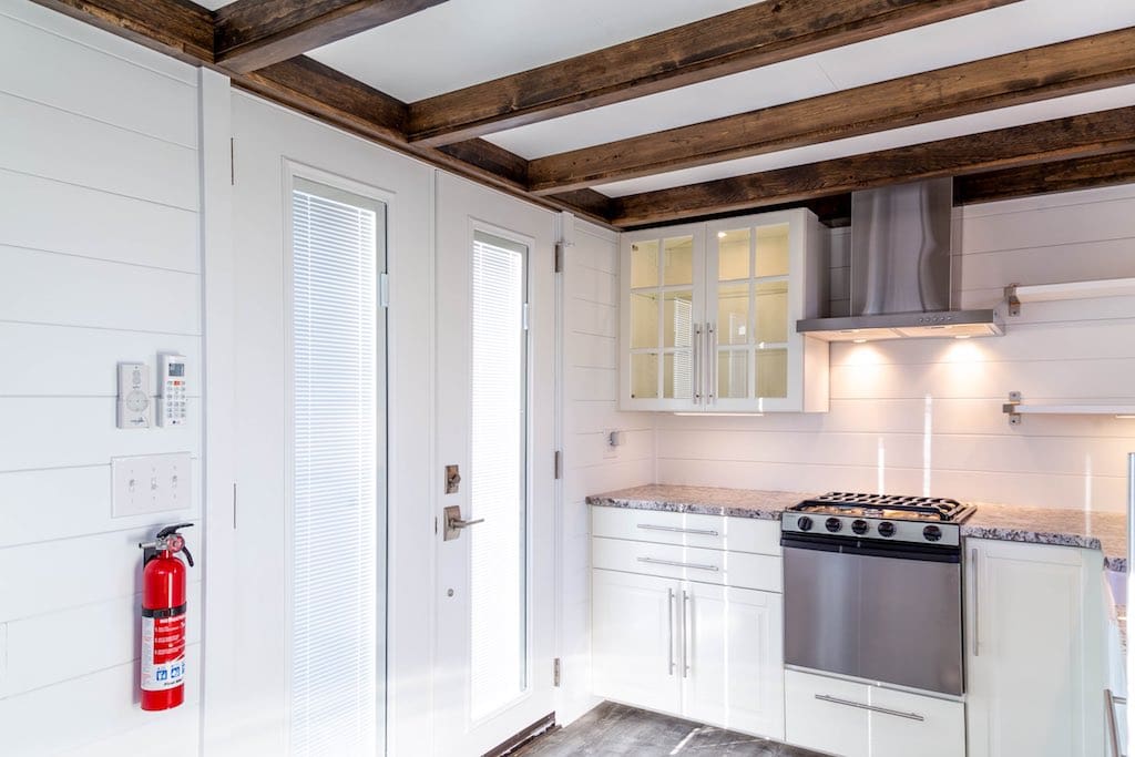 This 385-Square-Foot Modern Tiny House on Wheels Includes a Loft! 2 the modern tiny house home liberation tiny homes 3