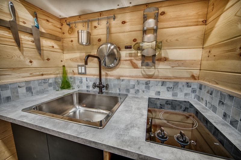 This 90-Square-Foot Tiny House Is Perfect To Live Large In A Small Space 14 Acorn Tiny House on Wheels by Backcountry Tiny Homes 6