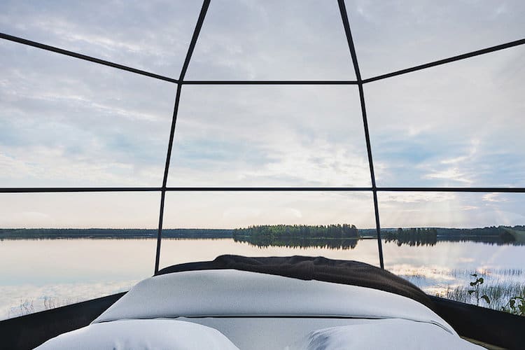 A Luxury Arctic Fox Glass Igloos Looking Up Northern Lights 8 glass igloos arctic fox igloos 3