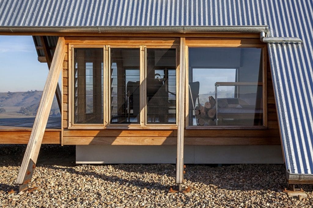 This Elegant A-Frame Rental in Australia Lets You Reconnect With Nature in Style 8 the a frame structure is elevated on pad footings