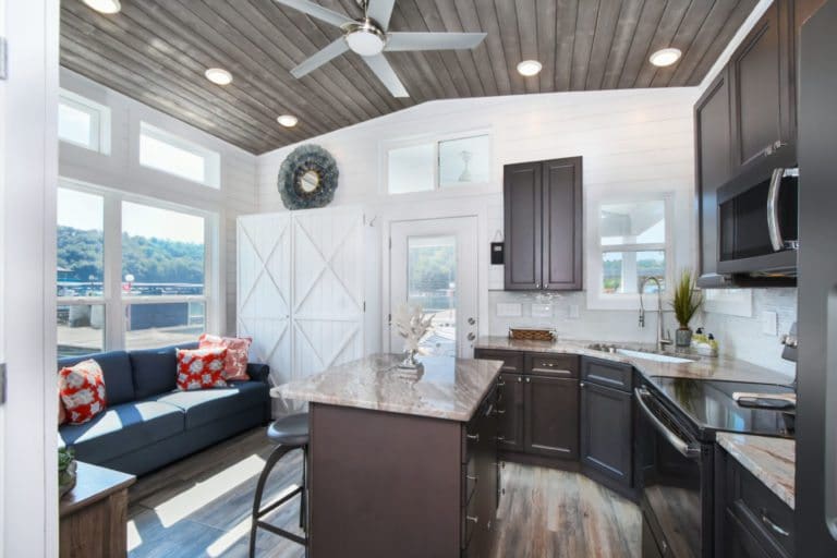 Float Your Cares Away on This Incredible Tiny Houseboat 5 Tiny Houseboat kitchen 768x512 1