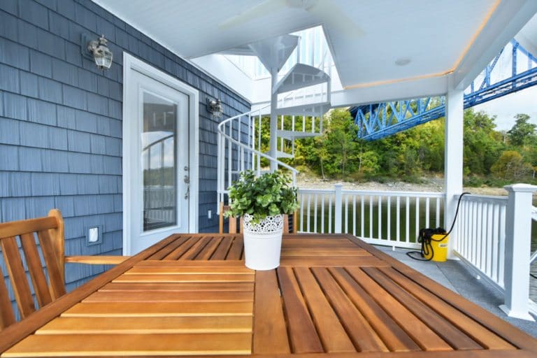 Float Your Cares Away on This Incredible Tiny Houseboat 8 Tiny houseboat patio 768x512 1