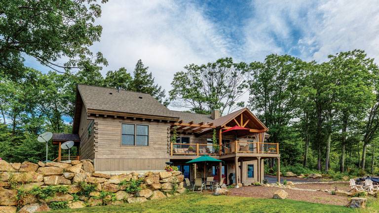 This New Hampshire Log Home Draws on Old Western Style 2 WHS 008 8542 2020 02 20 15 15 768x432 1