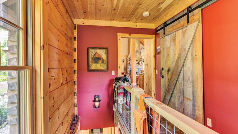 This New Hampshire Log Home Draws on Old Western Style 8 WHS 034 8542 2020 02 20 15 15 768x432 1