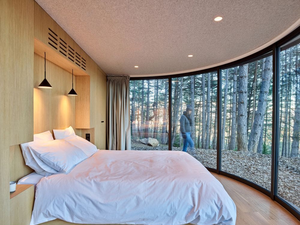 The LumiPod – A Contemporary Prefab Cabin With A Huge Curved Window 5 French Alps LumiPod design one room cabin