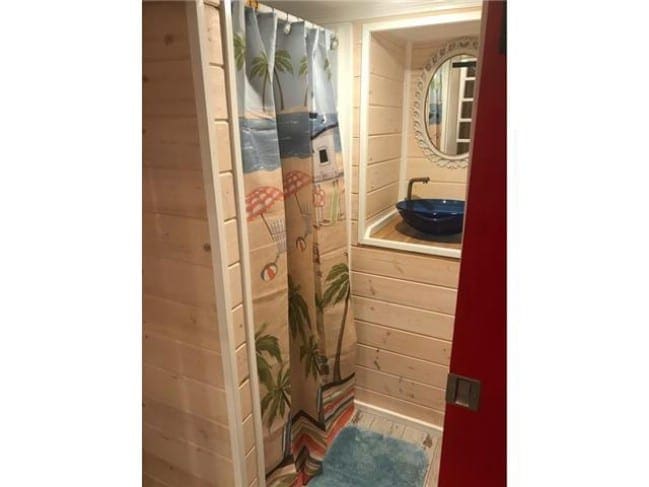 Spend The Night In This Breathtaking Tiny House 13 red lifeguard stand tiny house 14