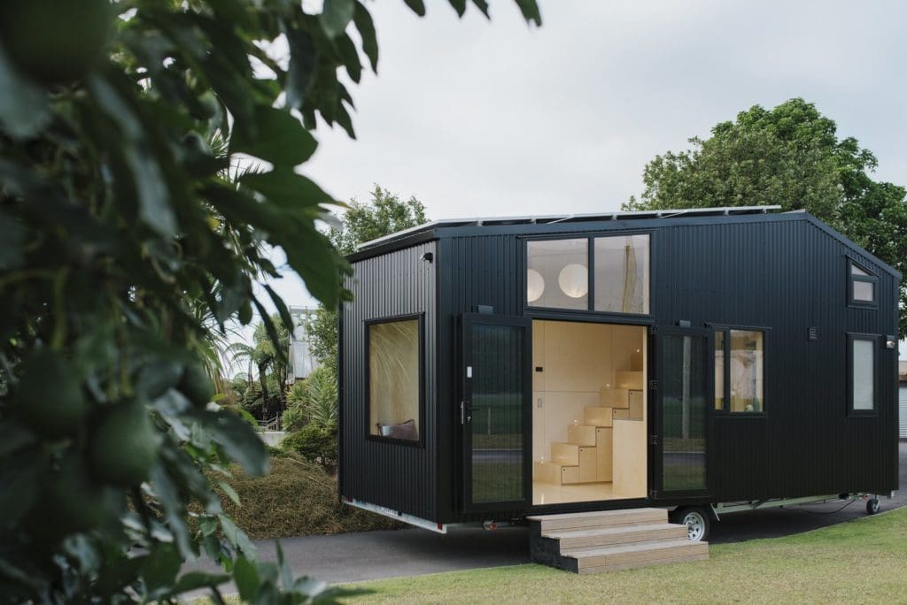 This Off-Grid Tiny Home Packs a Powerful Kitchen Into 183 Square Feet 1 the sizable plywood staircase 1