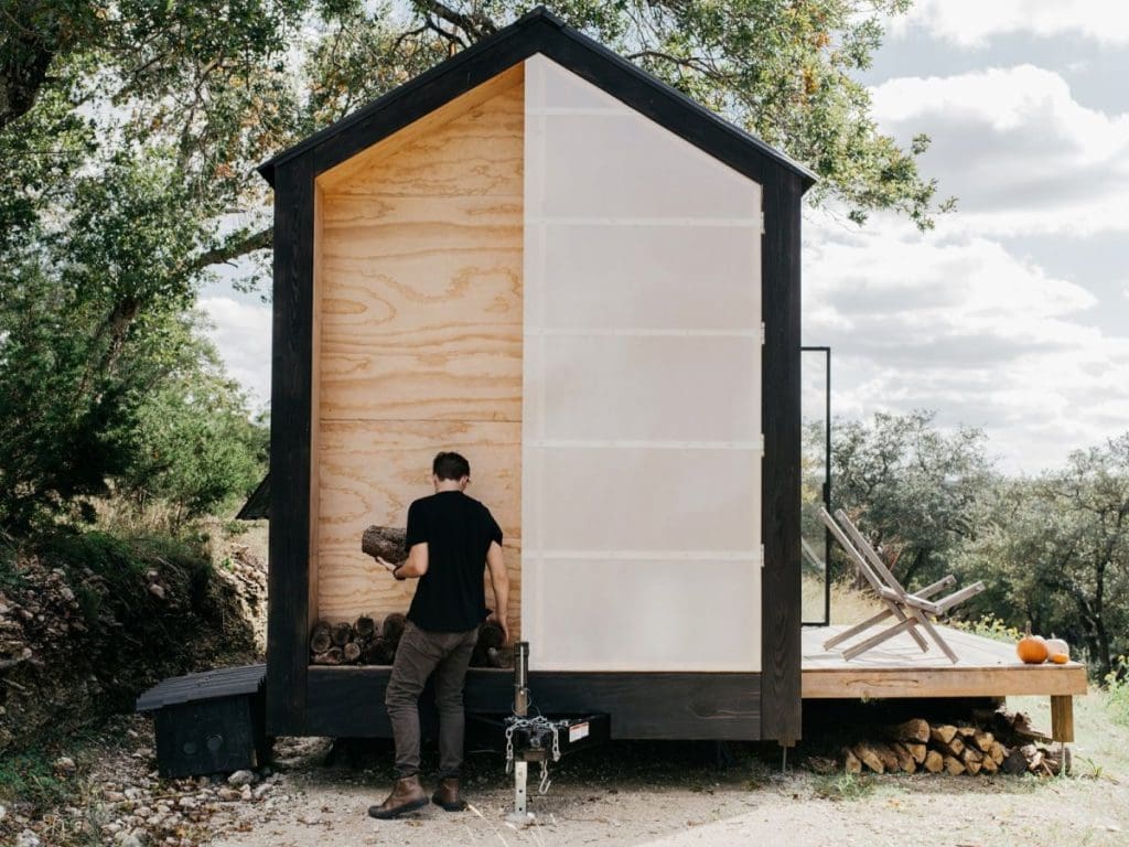 Tiny Cabin Retreat Reconnects Its Guests With Nature 2 Austin Texas Ryan McLaughlin Cabin firewood storage