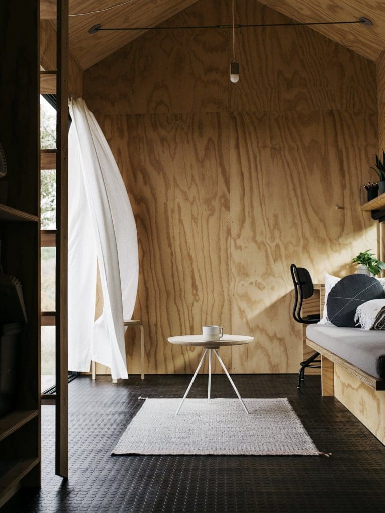 Tiny Cabin Retreat Reconnects Its Guests With Nature 3 Austin Texas Ryan McLaughlin Cabin rubber floor