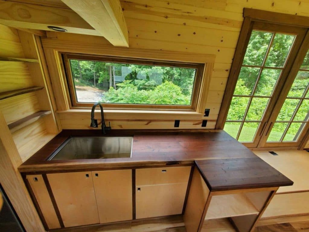 This WoodWorkers Dream Is A Tiny Houses On Wheels For Rustic Living 4 Woodworkers Cabin 10 1024x768 1