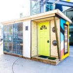 Cafam - A tiny cabin with bright colors painted to it