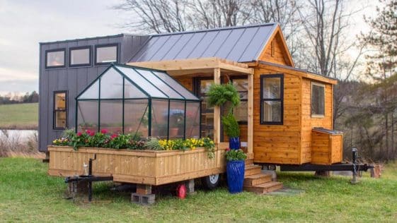 This Tiny Home Has a Greenhouse and a Porch Swing