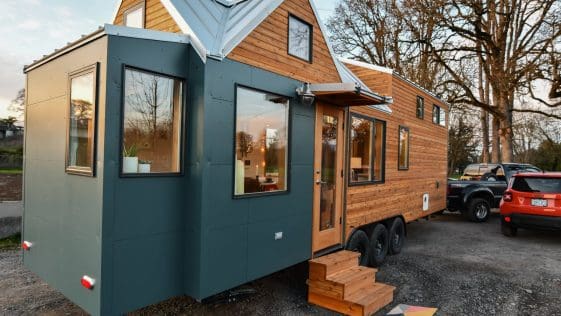 This Custom Tiny Home Has a Clever, Space-Saving Elevator Bed