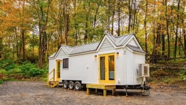 A 30-ft unique tiny house on wheels with big bedroom space
