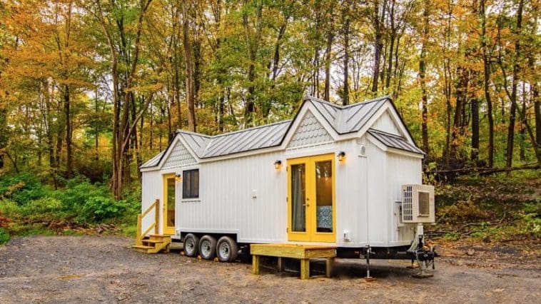 A 30-ft unique tiny house on wheels with big bedroom space