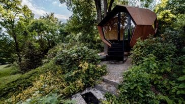 Hello Wood’s Workstation Cabin is a striking, timber-clad pod that can serve as a workspace, guest bedroom, or cozy lounge.