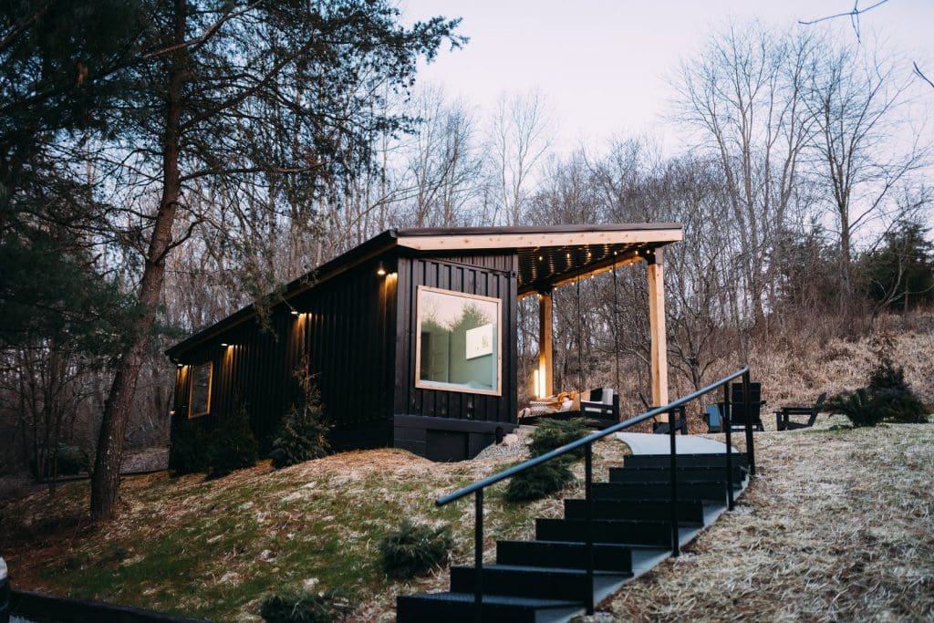 The Different Types of Tiny Homes 2 Types of Tiny Homes: The Lily Pad is a 280-square-foot black-painted shipping container home located near Hocking Hills State Park in Ohio.