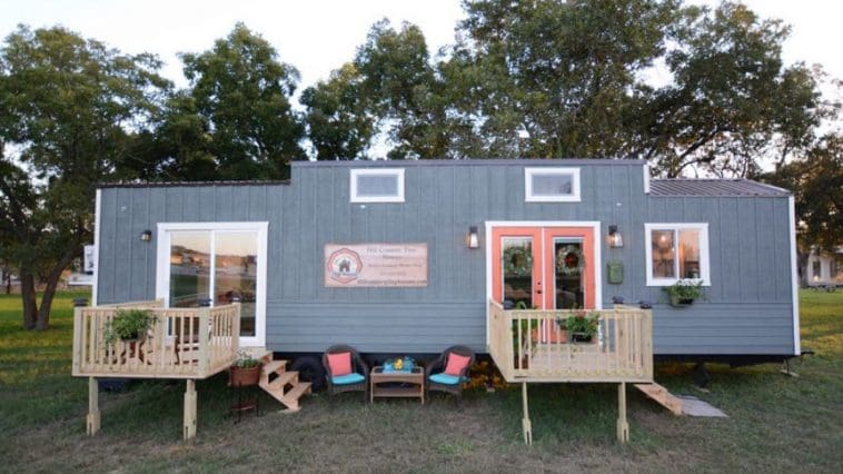 The 384-square-foot tiny home has two steel slide-outs, a main floor master bedroom, and an additional 70-square-foot loft.