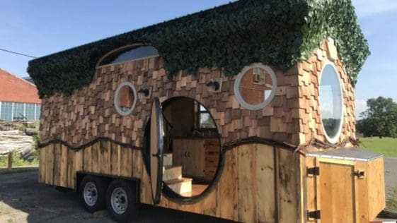 The Tiny Hobbit House on Wheels Incredible Tiny Home is based on a double axle, 20 ft (6 m)-long trailer and comprises a total floorspace of 160 sq. ft. (14.8 sq m).