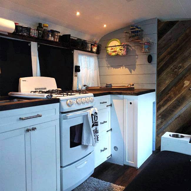 Techy Couple Convert School Bus Into Modern Tiny House And Escape The 9-5 7 8 bus tiny house