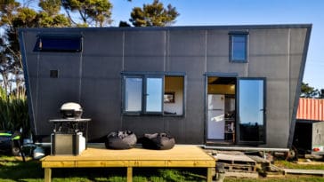 This Couple Built An All-Black Tiny House Powered By Solar Panels, And It's Every Goth Kid's Dream