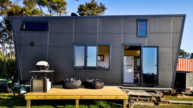 This Couple Built An All-Black Tiny House Powered By Solar Panels, And It's Every Goth Kid's Dream