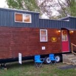 THIS SPLIT LEVEL FAMILY TINY HOME IS FILLED WITH HIDDEN STORAGE