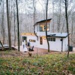 THIS RETRO TWO STORY TINY HOUSE IS MADE FROM SHIPPING CONTAINERS