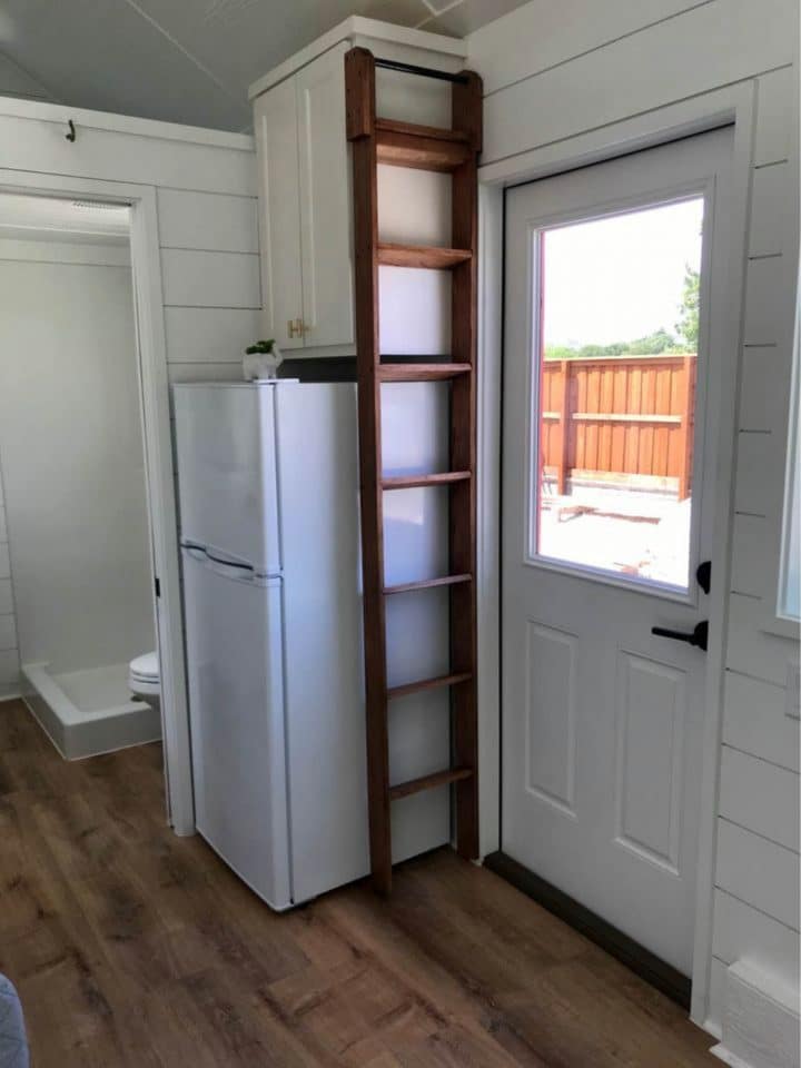 The Athena Tiny Home Includes A Captain's Bed For Extra Storage 3 The Athena 9 720x960 2