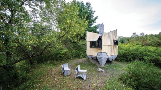 Ashen Cabin Hannah is made of salvaged materials, 3D printing, and robotic technology to create an otherworldly cabin in upstate New York.