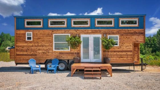 This 28-Foot Bumper Pull Tiny House Has Spacious Living Room With Trundle Bed
