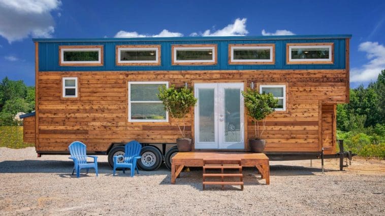 This 28-Foot Bumper Pull Tiny House Has Spacious Living Room With Trundle Bed