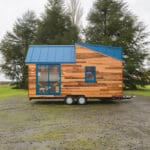 Mogote Is A 20-Foot Home With A Large Sliding Door and Detailed WoodWork Throughout