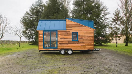 Mogote Is A 20-Foot Home With A Large Sliding Door and Detailed WoodWork Throughout