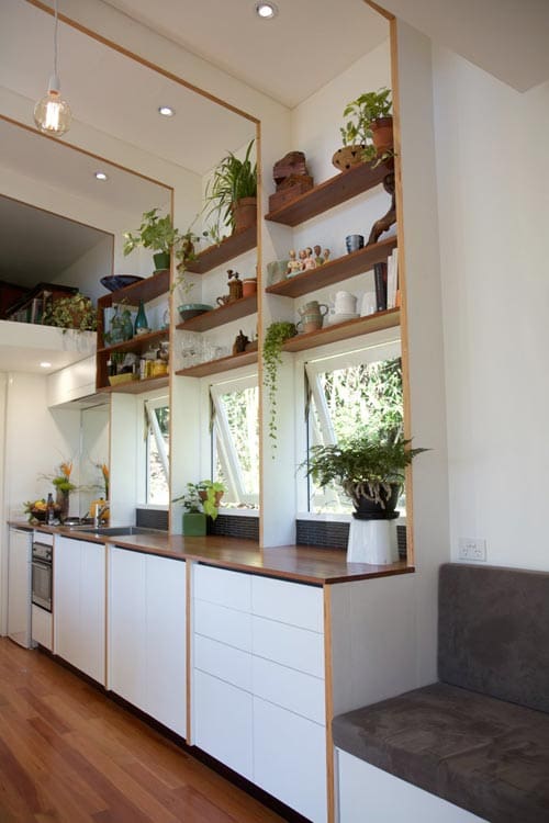 This Modern Aesthetic Tiny House Creates A Spacious Feeling While Incorporating Recycled Hardwoods 10 portal 12