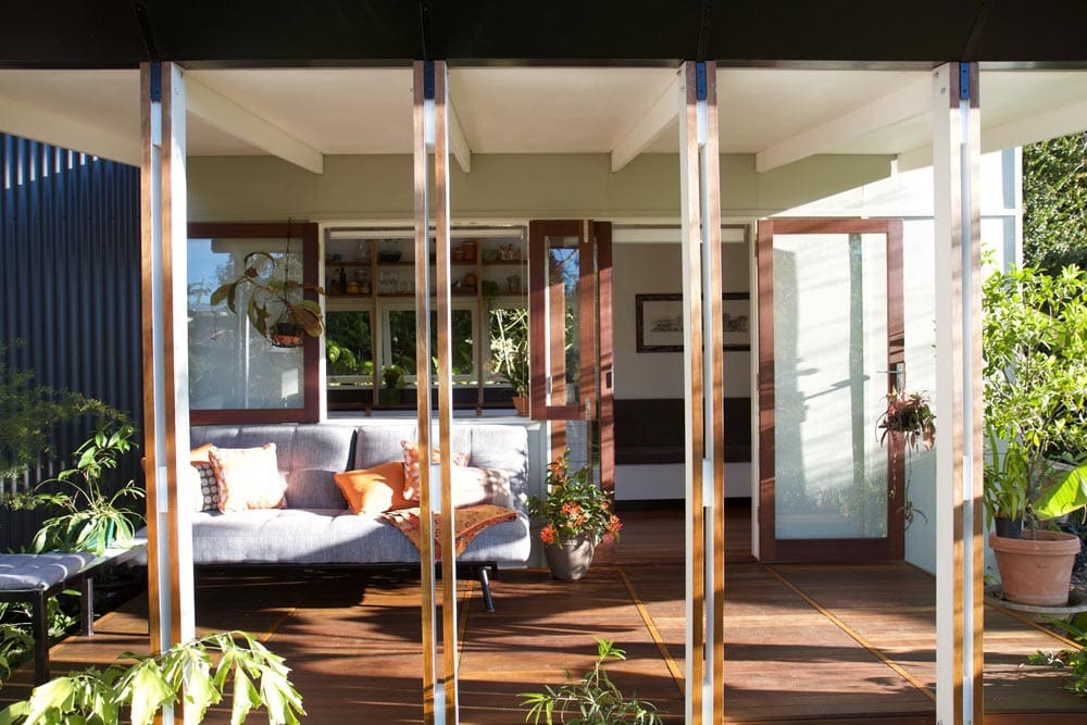 This Modern Aesthetic Tiny House Creates A Spacious Feeling While Incorporating Recycled Hardwoods 2 portal 2