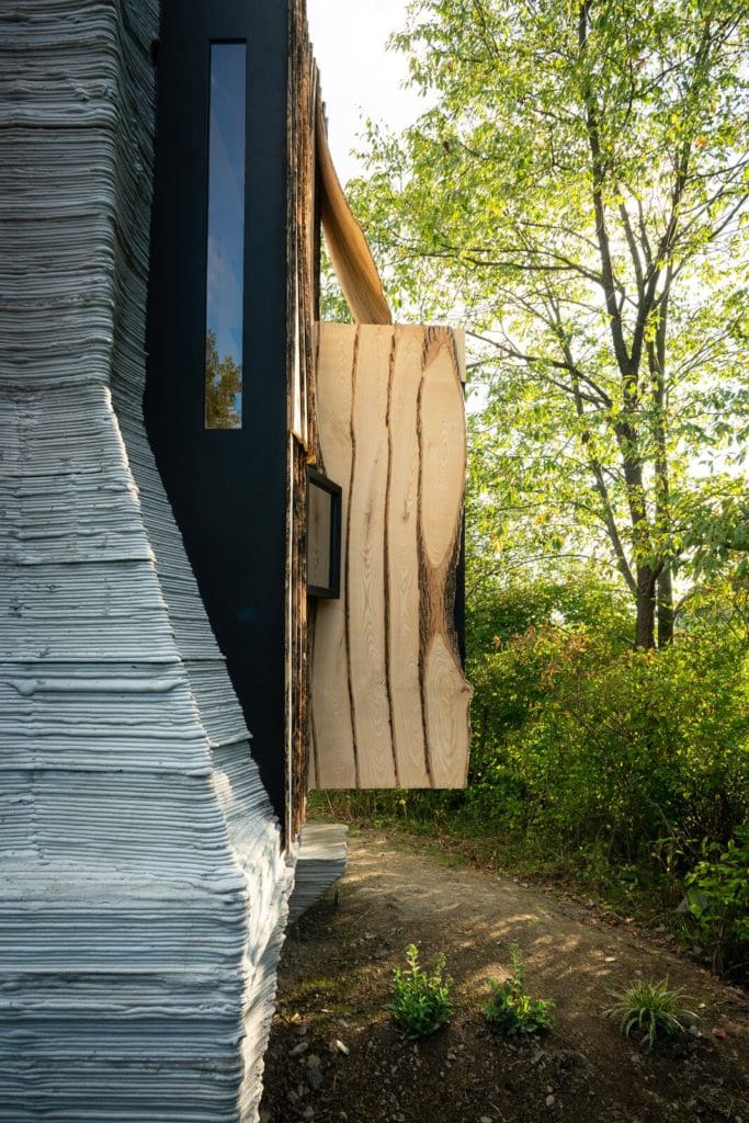 This Tiny 3D-Printed Cabin Makes a Big Statement About Sustainability 2 the 3d printed stilts