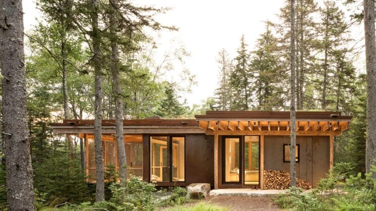 A Tiny Cor-Ten Steel Cabin Is in Perfect Sync With the Surrounding Woods