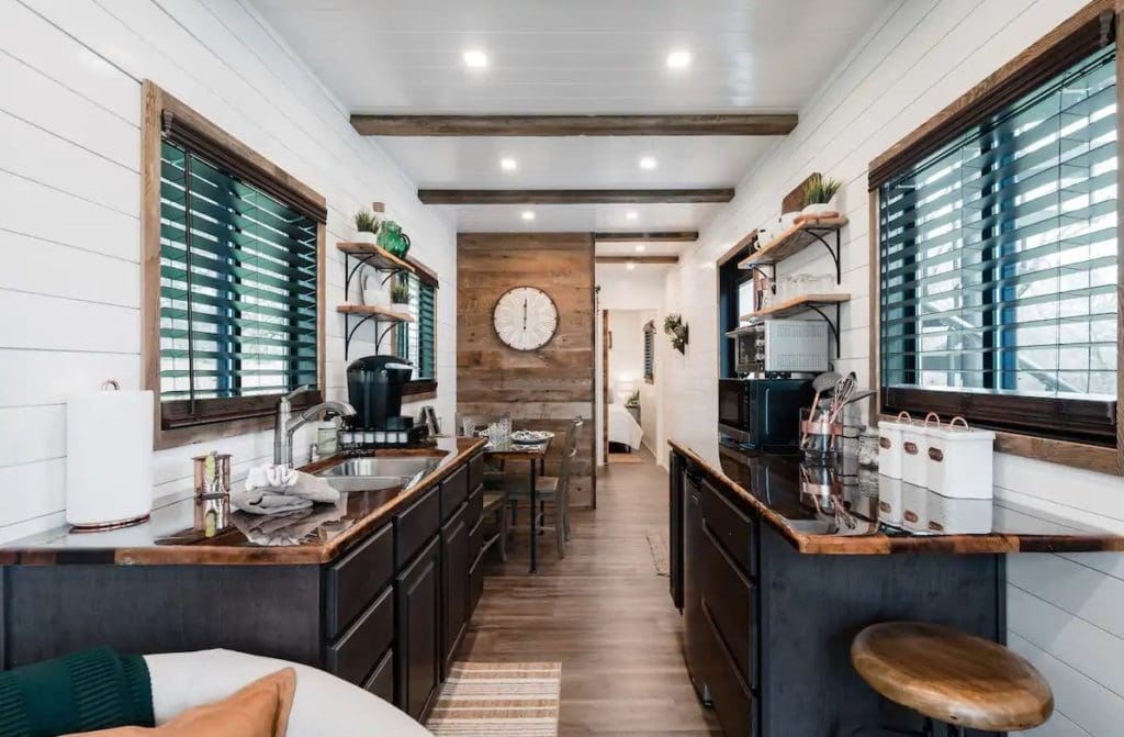 the helm a two story tiny house made out of shipping containers 6