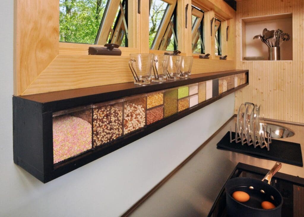 Smart storage solutions are essential for tiny houses to make living in a small space more efficient and organized.