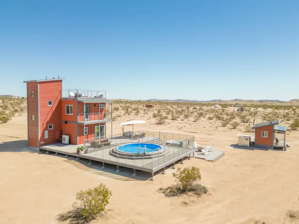 A Vertical Wonderland: 3-Story Shipping Container Home 5 Experience the Ultimate Fusion of Modern and Nature with SkyBox's 3-story shipping container home