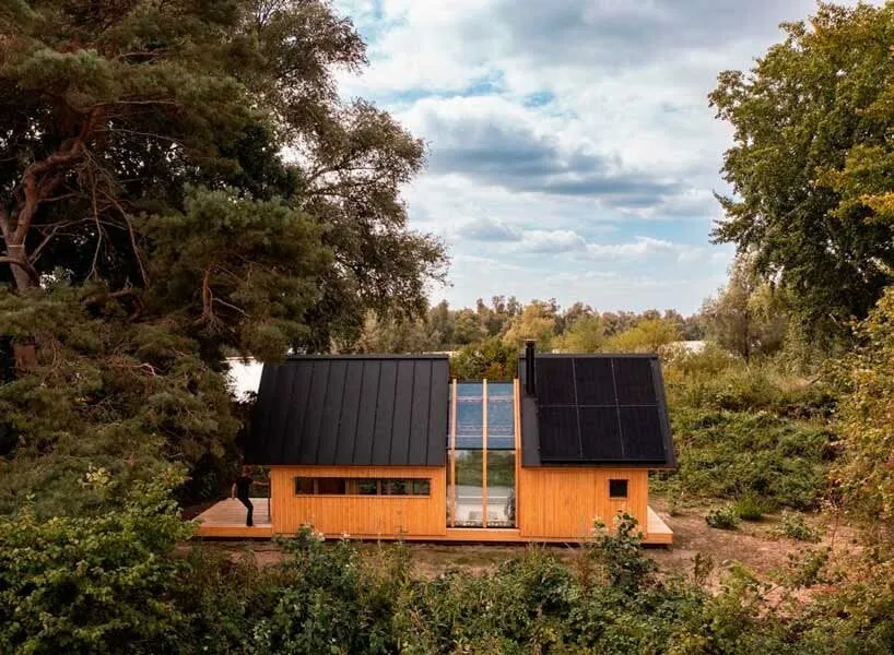 The Innovative Wooden Cabin: A Sliding Double-Shell Design by Caspar Schols 1 Eco-friendly building materials used in the construction of a wooden cabin