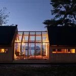 A modern wooden cabin showcasing innovative design elements.