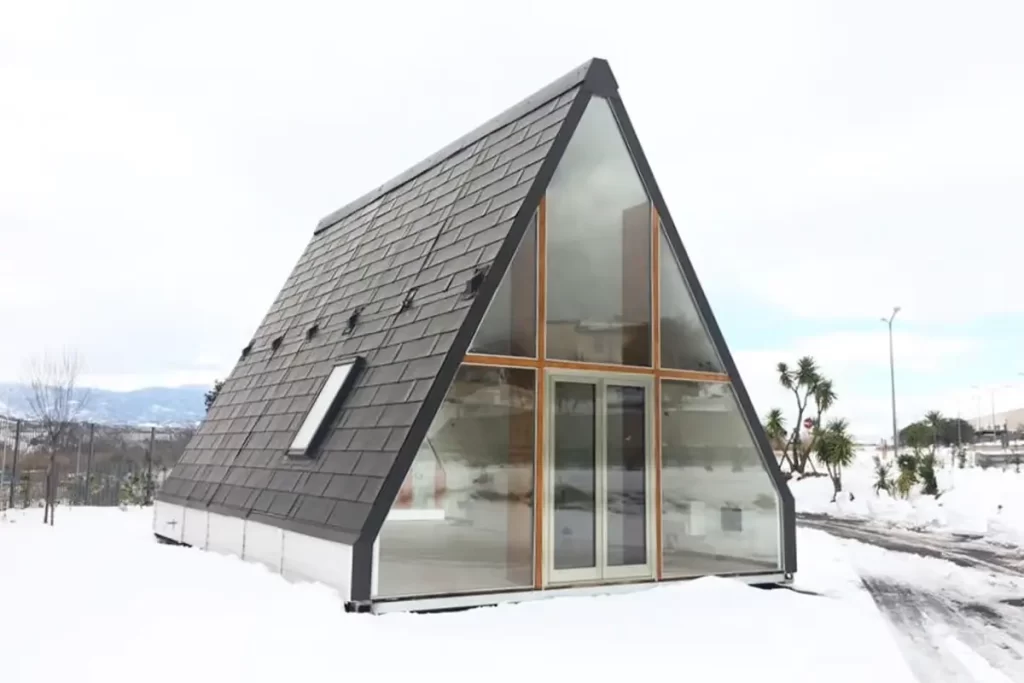 An innovative A-frame M.A.Di Home with a unique design and energy-efficient features.