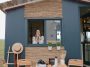 Woman Inside A Tiny House